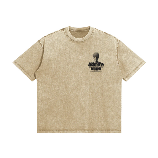 Beige t-shirt with a graphic design on a gray background